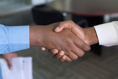 Two people shaking hands